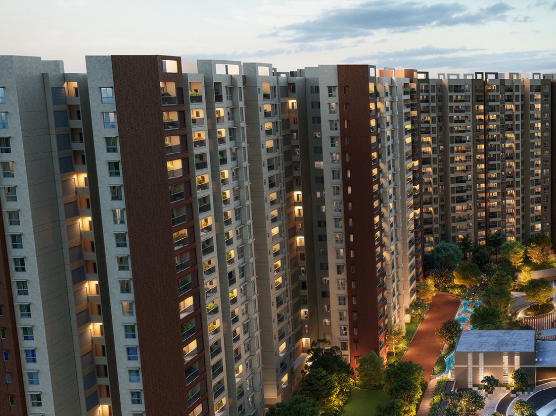 Aerial daytime view of Evergreen towers and green landscape